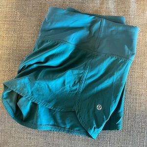Like new condition women's lululemon size 8 shorts. Teal color!